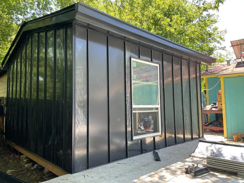 Black standing seam metal wall panels for Metal Roof Installation in Sunset